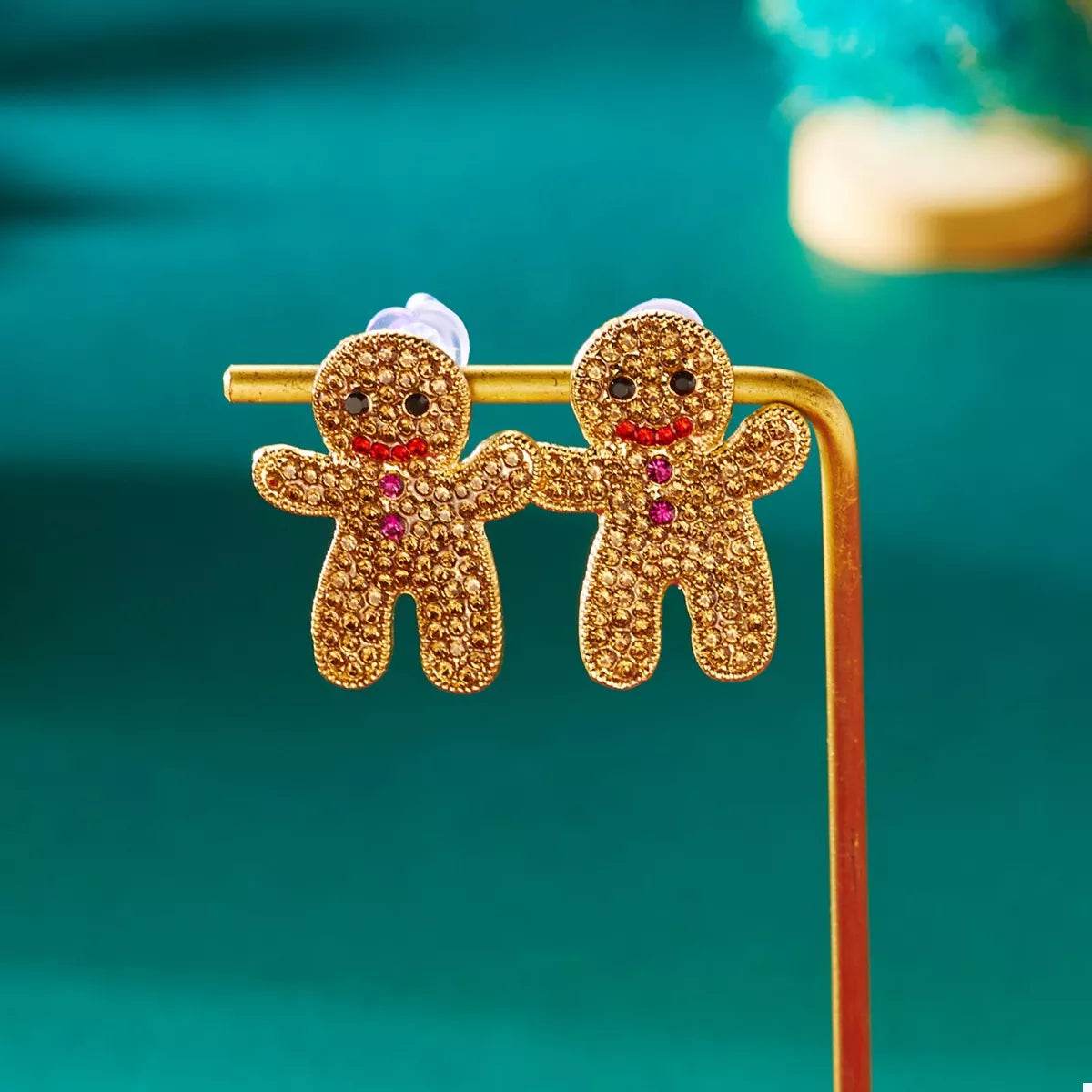 Boucles d’oreilles pain d’épices scintillantes en forme de bonhomme avec détails en strass